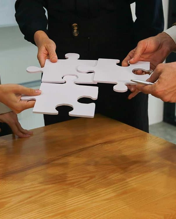 Professional services team aligning on strategy together